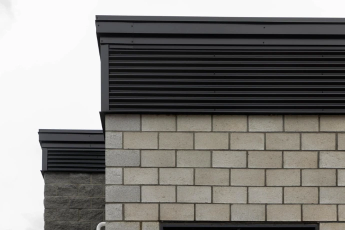 mur Isobloc finition béton architectural maçonnerie isolée